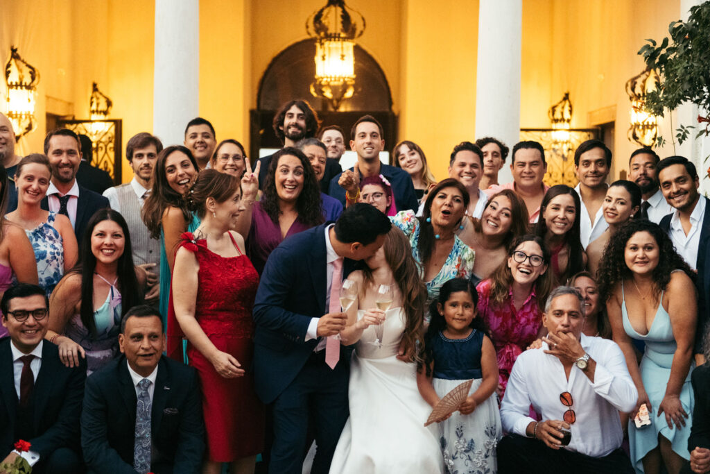 A group photo captures the gathering of friends and family, smiling faces together, creating a heartwarming and memorable moment in celebration