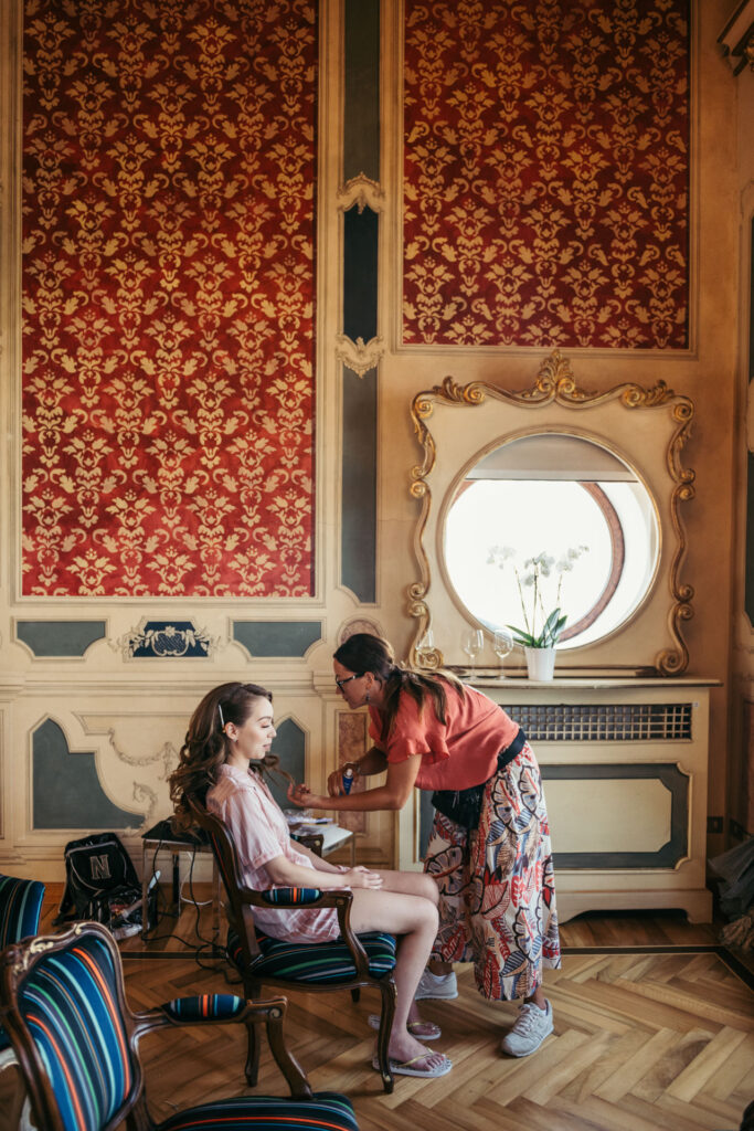 The bride prepares for her special day in a charming Venetian-style house, surrounded by the timeless elegance of Venetian decor