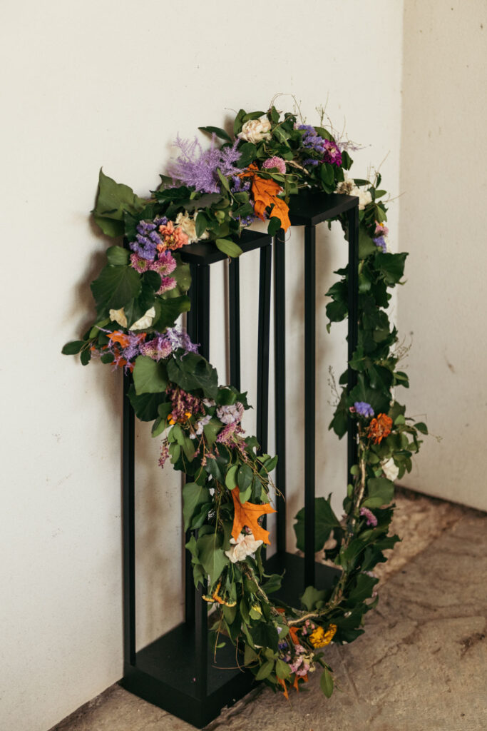 The lazo, a symbol of eternal love, gracefully drapes over the shoulders of the bride and groom, capturing the essence of their commitment in a heartfelt wedding ceremony