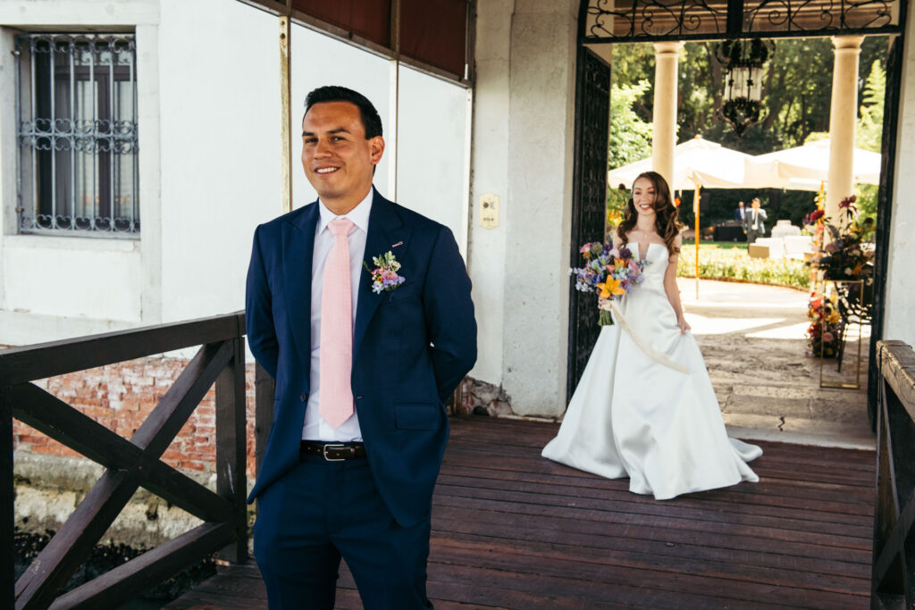 Emotional first look photos document the intimate and genuine reactions of the bride and groom as they see each other for the first time on their wedding day, creating timeless memories