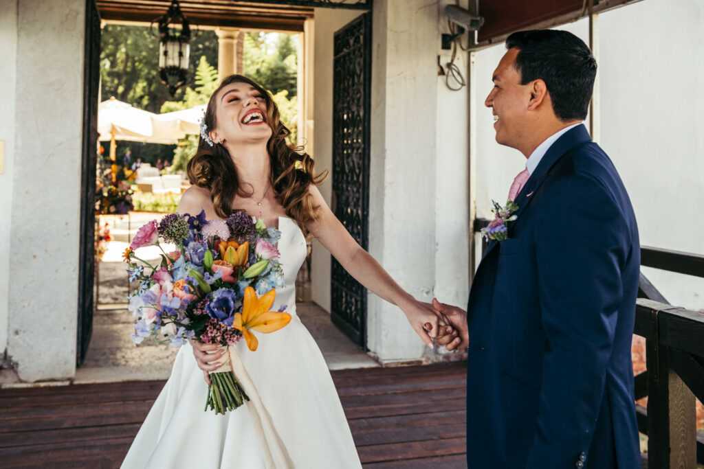 Emotional first look photos document the intimate and genuine reactions of the bride and groom as they see each other for the first time on their wedding day, creating timeless memories