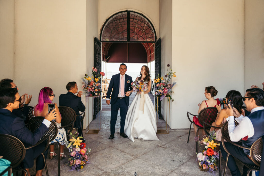 The bride and groom arrive in style at the NH Collection Venezia Grand Hotel Palazzo dei Dogi, setting the tone for an elegant and memorable wedding ceremony in Venice