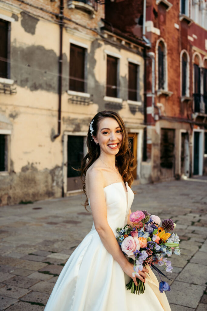 A captivating portrait of the bride, her beaming smile illuminating the frame with pure happiness on her special day