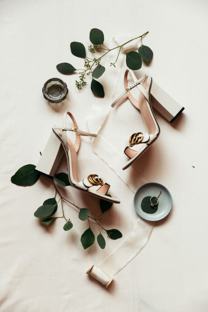 Flat lay of bride's wedding shoes