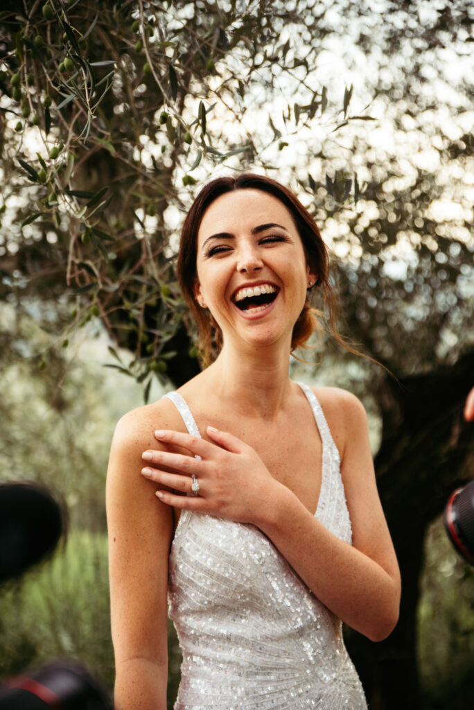 Bride smiling happily during bridal photos