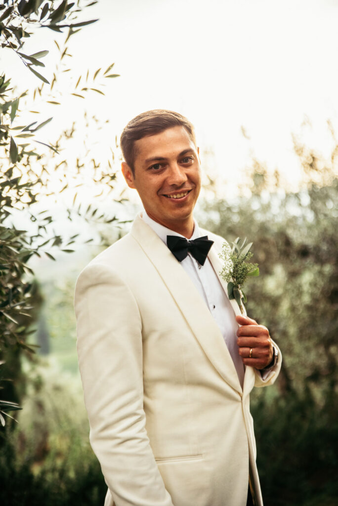 Groom photo portrait while looking in the camera