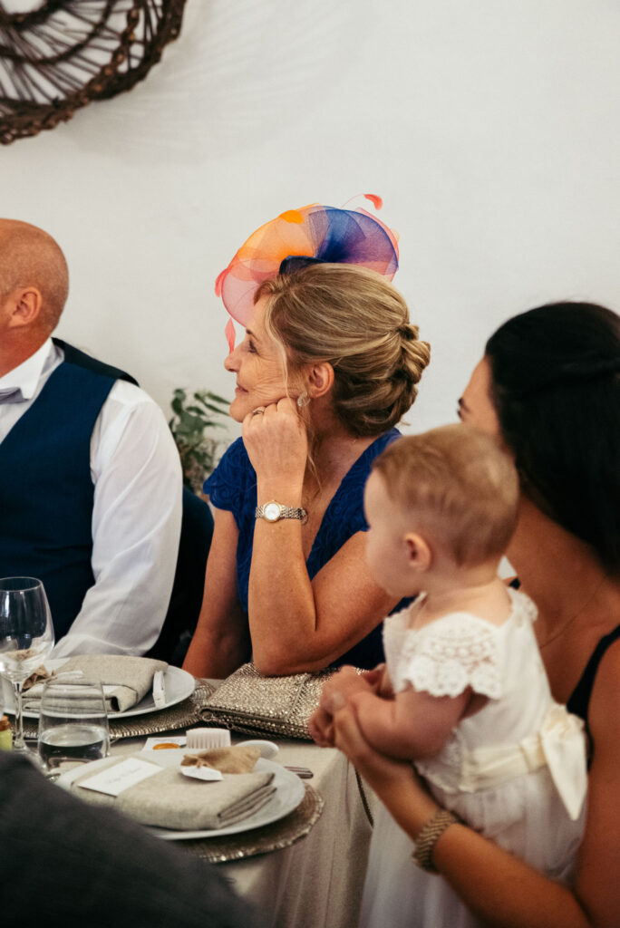 Mum of the bride listens to the speeches