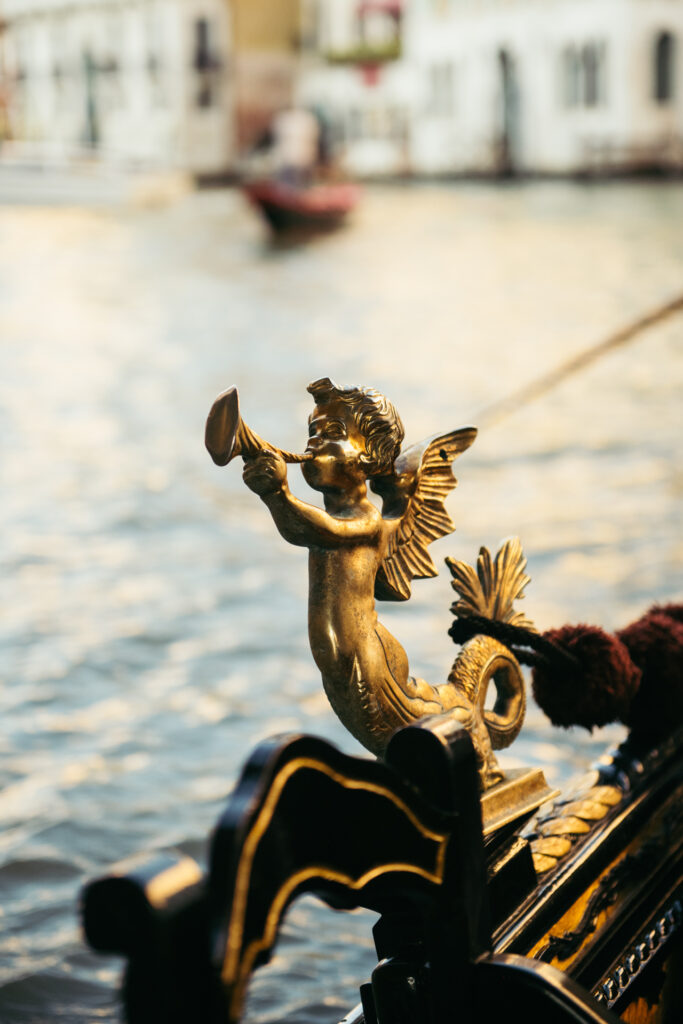 Close-up of an angel detail on a Venetian gondola