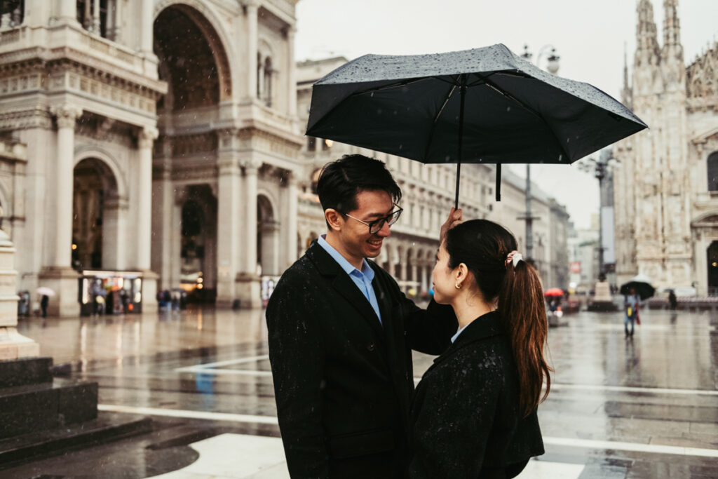 Couple looking at each other in Duomo Square, Milan
