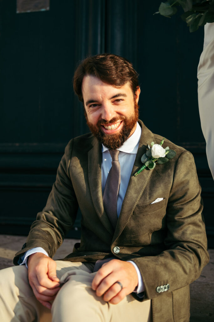 Groom happily shows off his socks