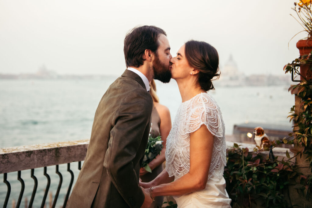 Bride and groom kisses after getting married