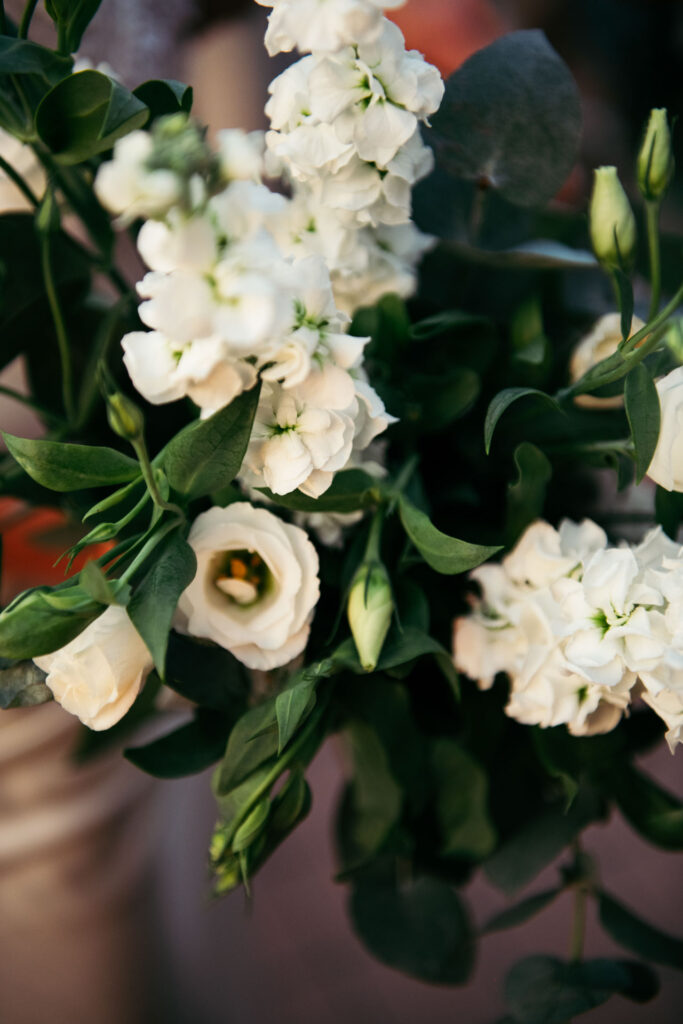 Close-up of the bride's bouquet with white flowers