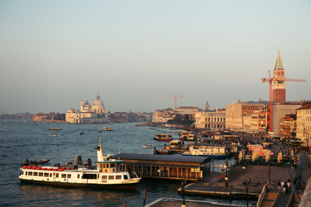 The sun raised on Venice lagoon and San Marco square