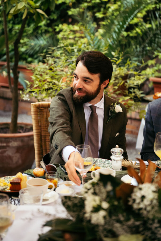 Groom sitting at the table