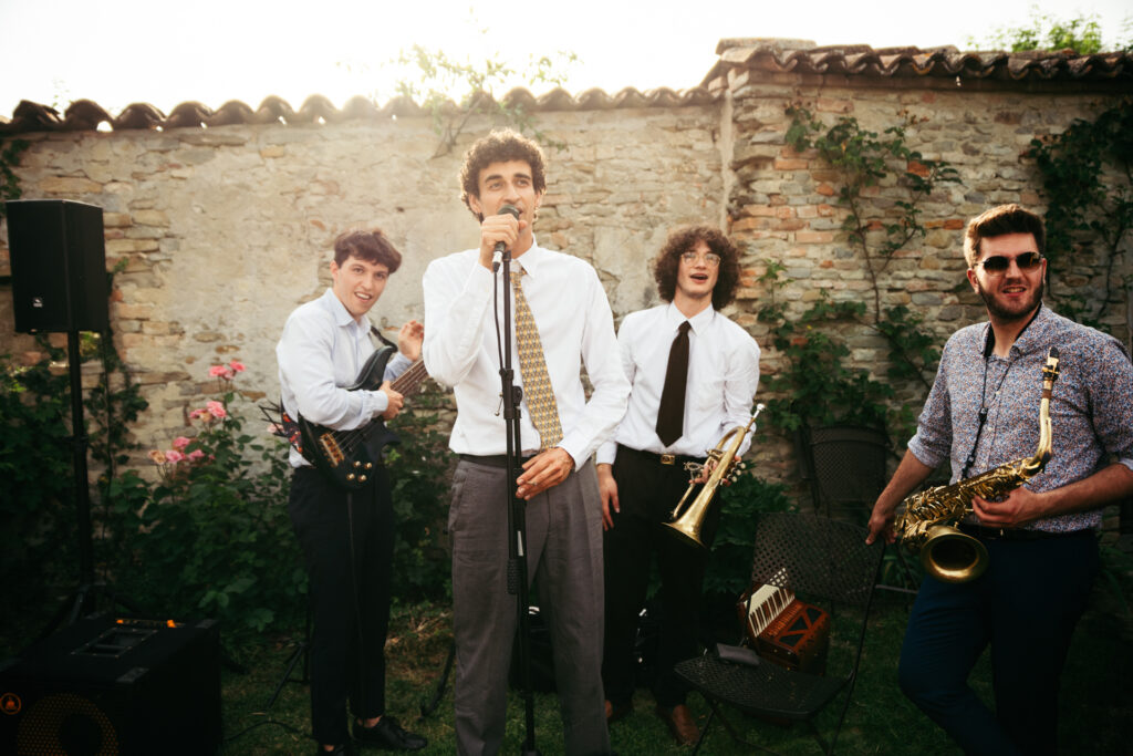 Band playing during sunset at the wedding reception