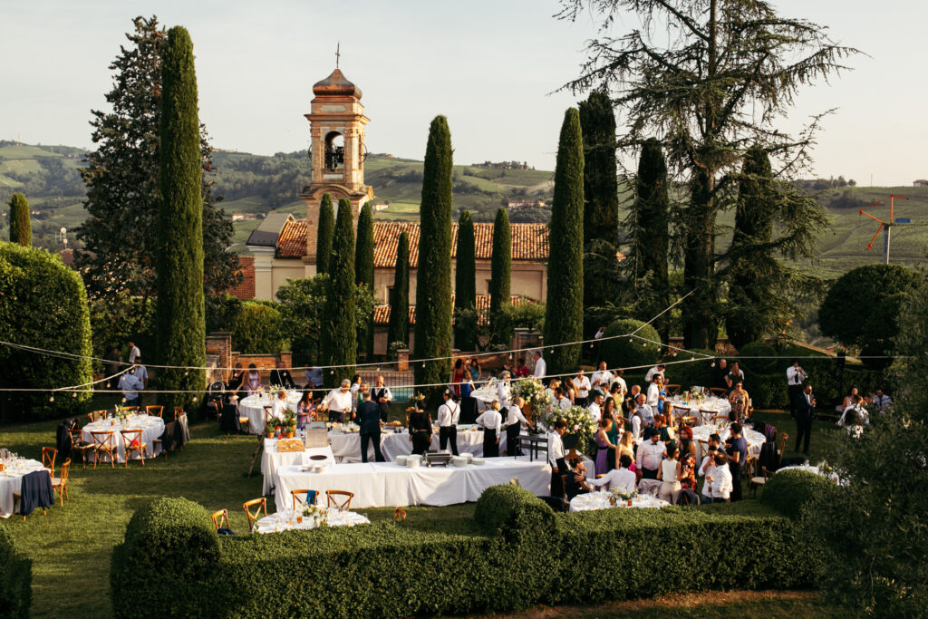 Wedding reception setup with rustic decor in a Langhe castle