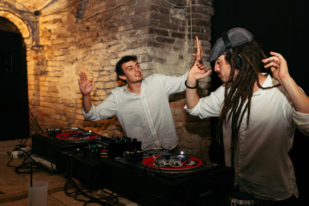 DJ playing music during the wedding party at Castello di Coazzolo