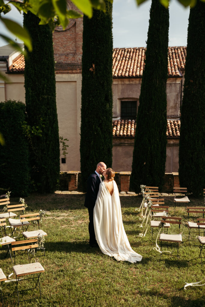 Bride and groom kiss alone after all the guests left for the reception