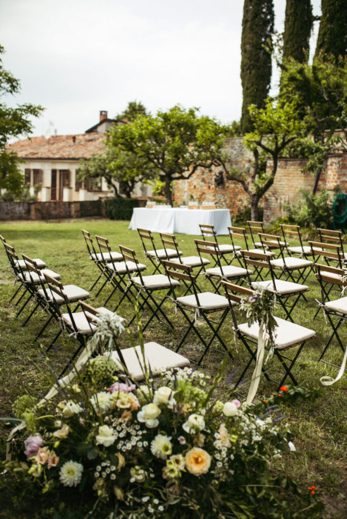 Wedding ceremony in the garden of Castello di Coazzolo