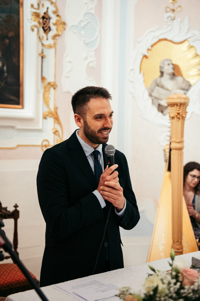 Wedding celebrant speaking during the micro-wedding at CastelBrando.
