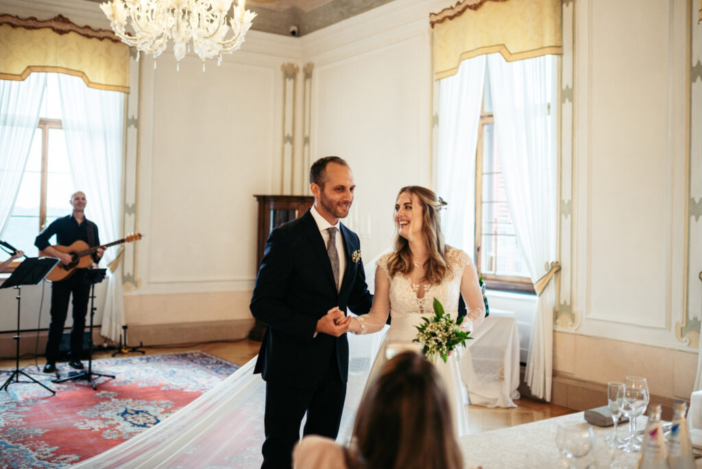 Bride and groom during their intimate indoor wedding ceremony at CastelBrando.