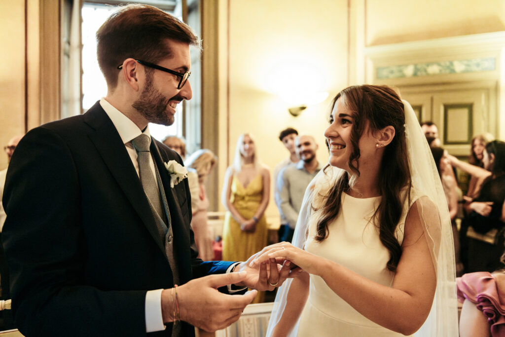 Groom exchanging rings with the bride during the civil wedding