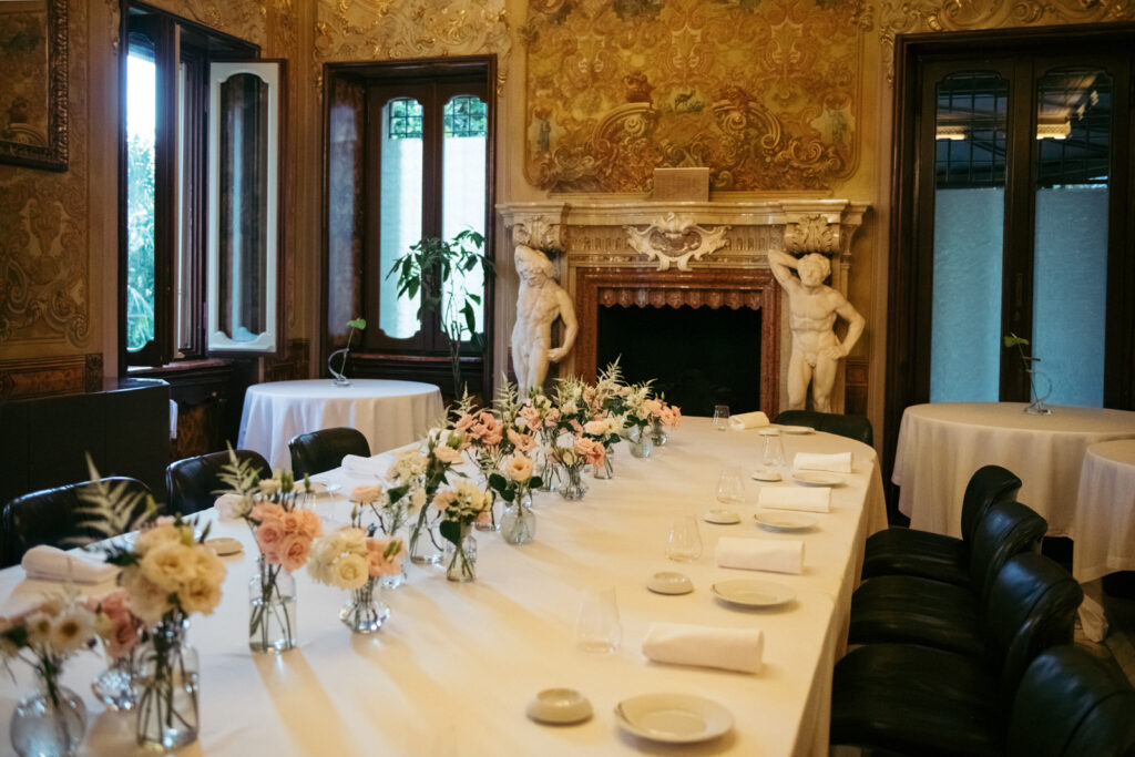 Reception table set for guests inside Villa Elena’s ornate dining room