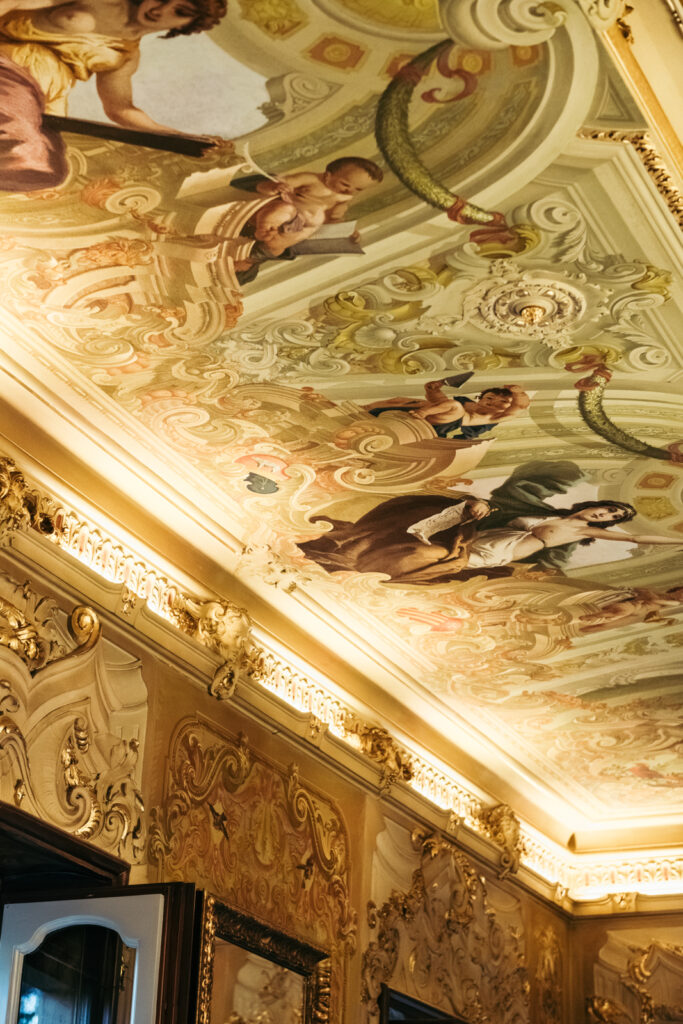 Frescoed ceiling detail inside the historic villa venue in northern Italy