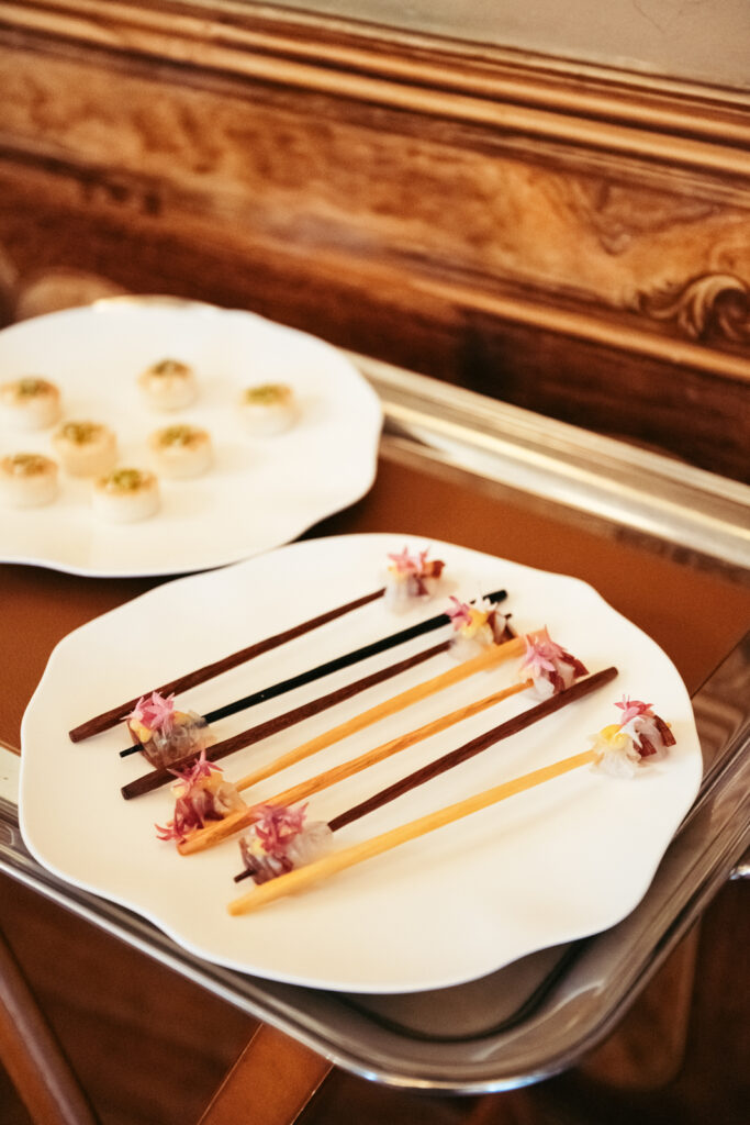 Skewered hors d’oeuvres arranged neatly for guests at the Italian wedding