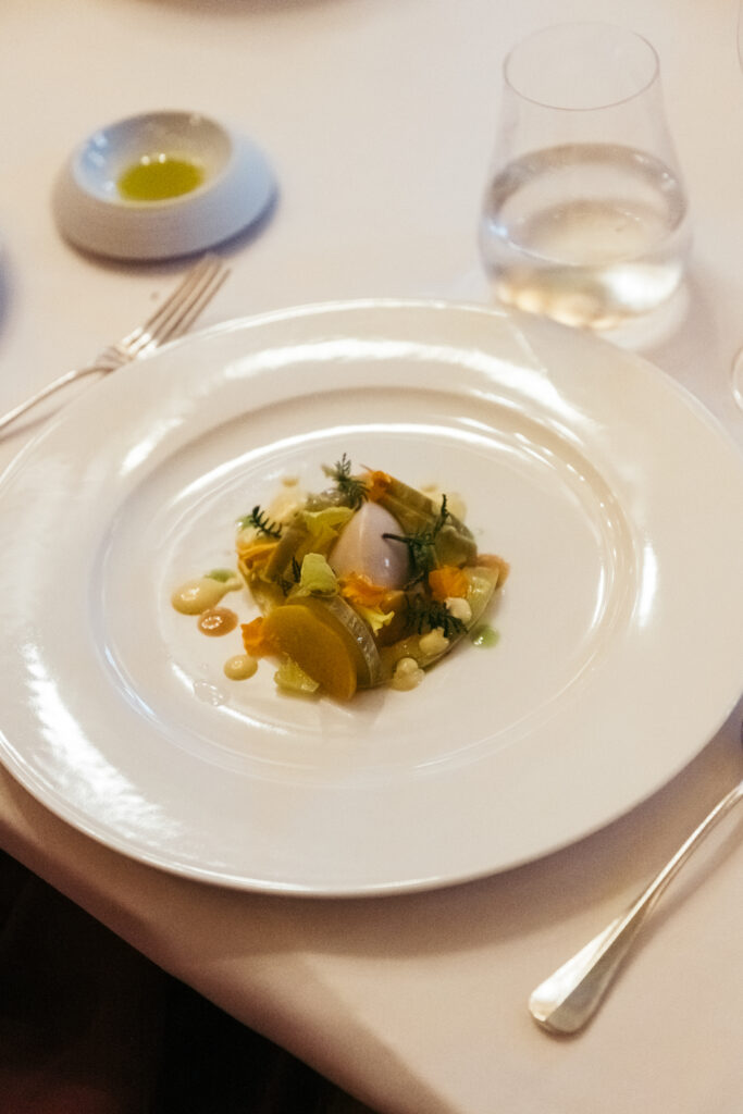 Michelin star wedding entrée served on elegant white porcelain