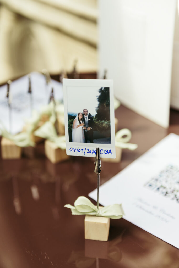 Polaroid guest photo displayed as part of the wedding table decor