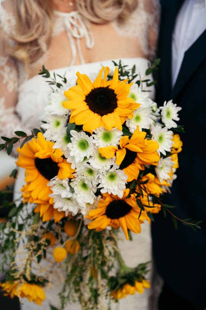Bright sunflower and daisy bouquet close-up from a Venice elopement